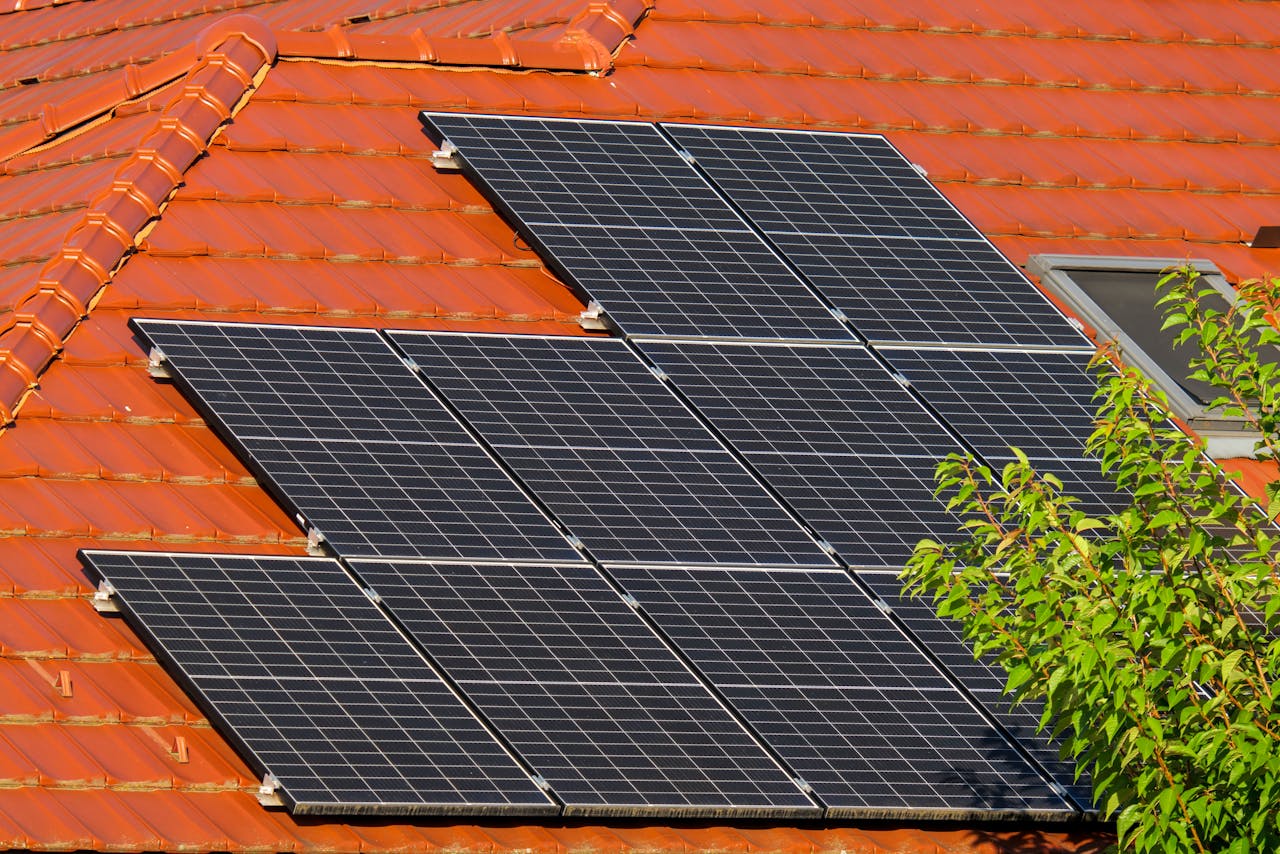 About Close-up of solar panels on a red tiled roof in Croatia, highlighting renewable energy.
