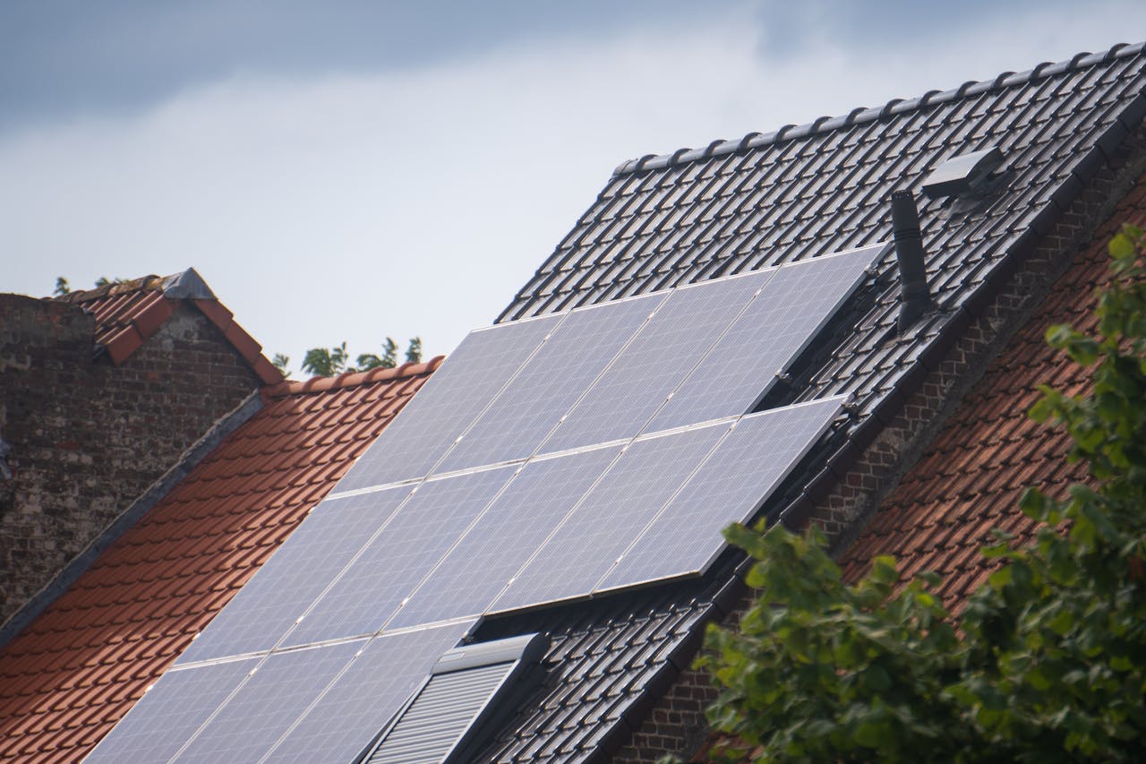 About Solar panels installed on a residential rooftop, showcasing eco-friendly renewable energy solutions.